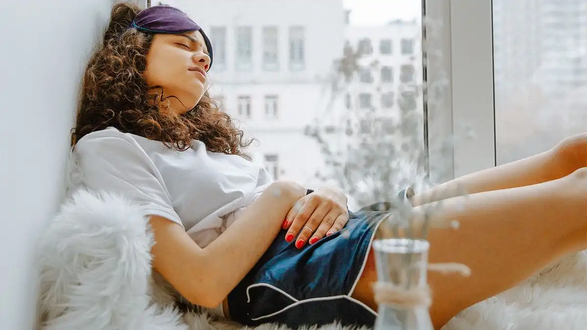 7 Ways Your Period Is Screwing Up Your Teeth & Gums